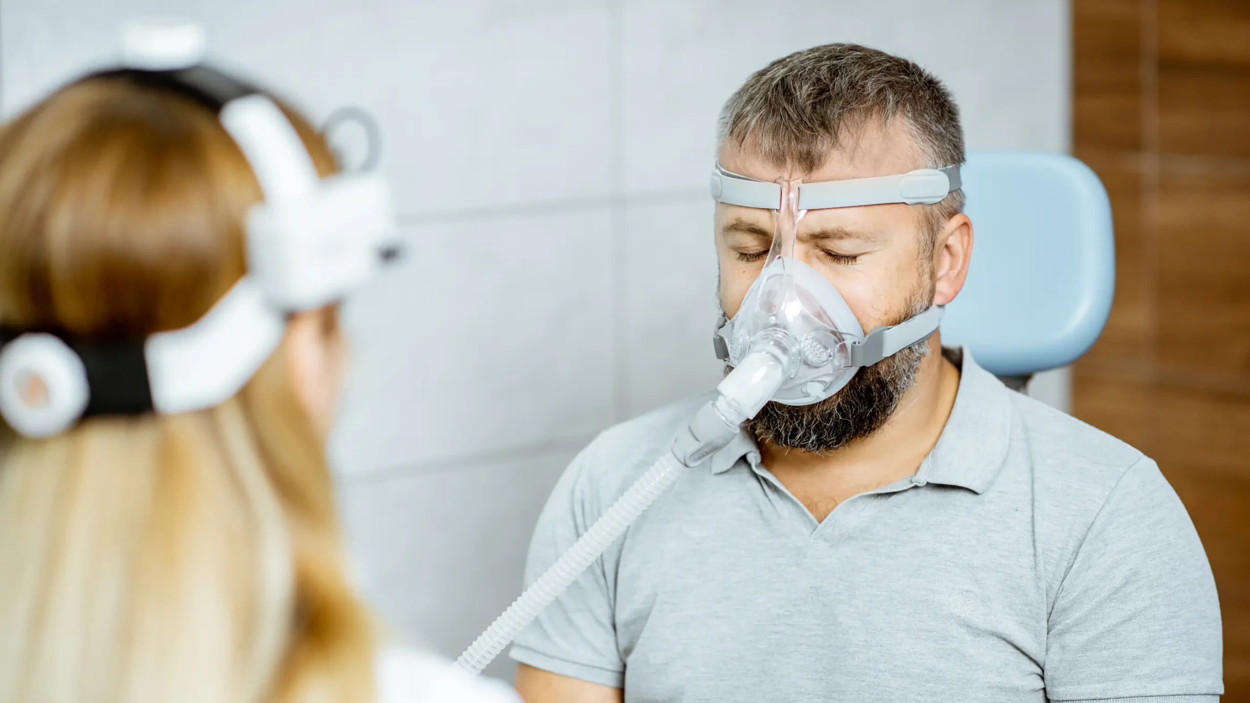 A LiveWell Dental provider talking with a patient about sleep apnea care